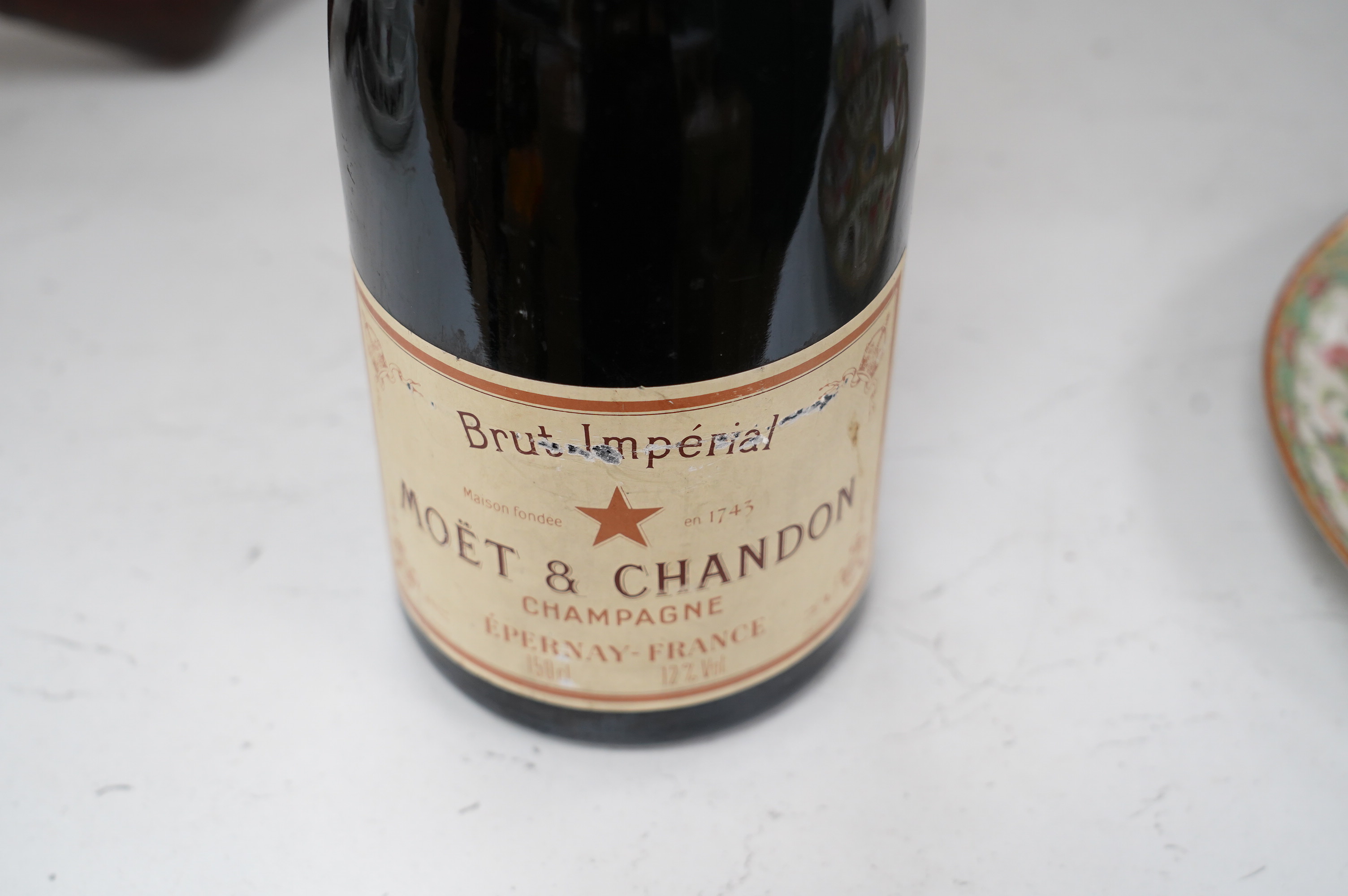 A Magnum of Moet & Chandon champagne. Condition - fair, some wear to label and foil